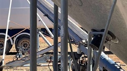Industrial machinery comes to the rescue to help outload sticky fertiliser